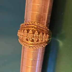 Size 7 Diamonds all around. Cocktail ring or engagement bling.